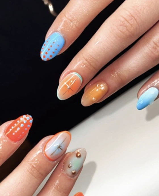 Mismatched Almond Nails with Ombre, Polka Dots, and Starburst Design