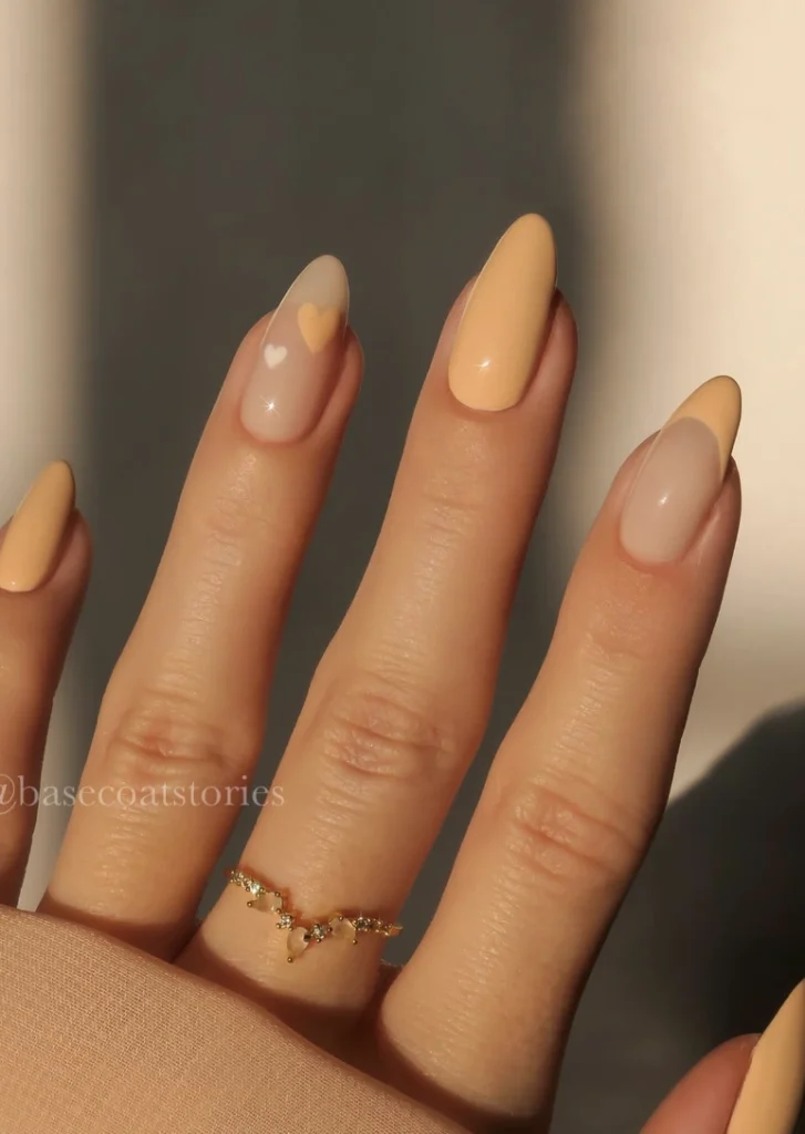 Mixed Almond Nails with Pastel Peach and Heart Decals