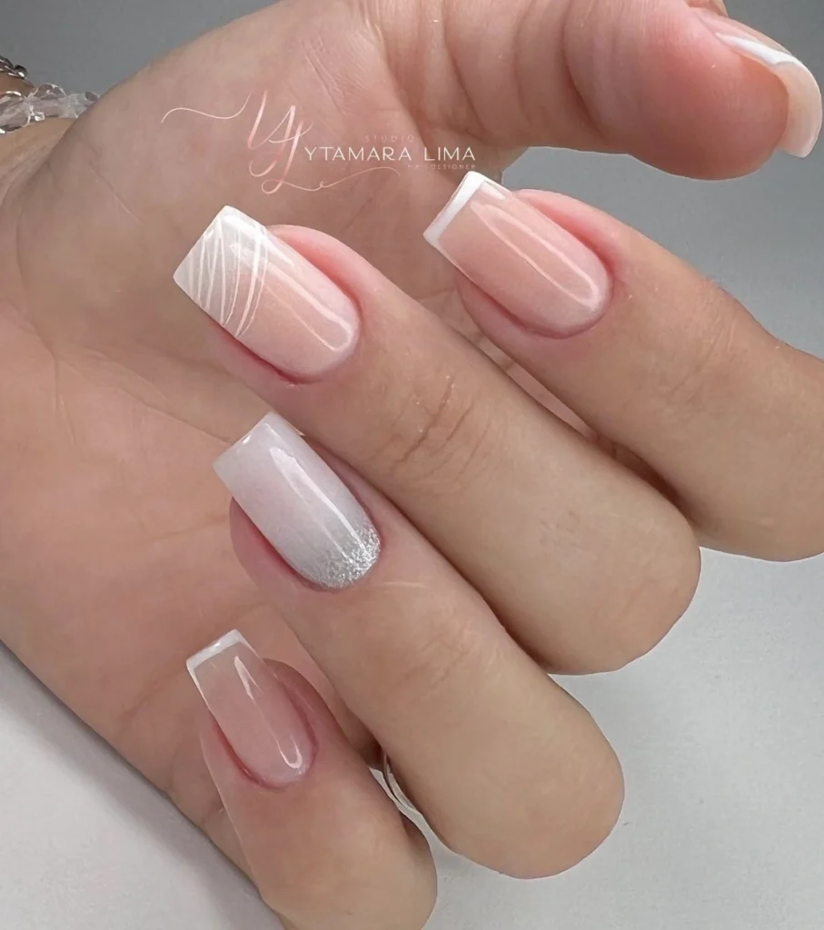 Modern French Manicure with Abstract Accent and Silver Glitter Fade
