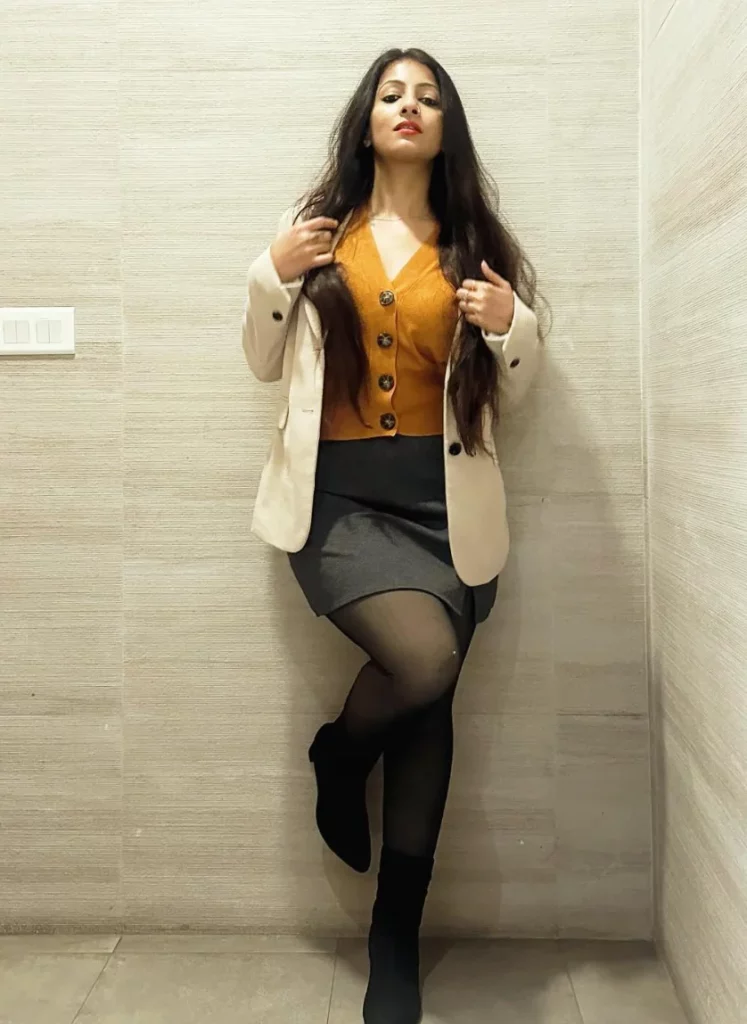 Mustard Knit Cardigan + Cream Blazer + Dark Gray Mini Skirt + Black Tights + Black Ankle Boots