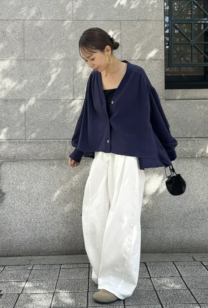 Navy Button-Up Cardigan + Black Tube Top + White Wide-Leg Pants + Beige Slip-On Flats