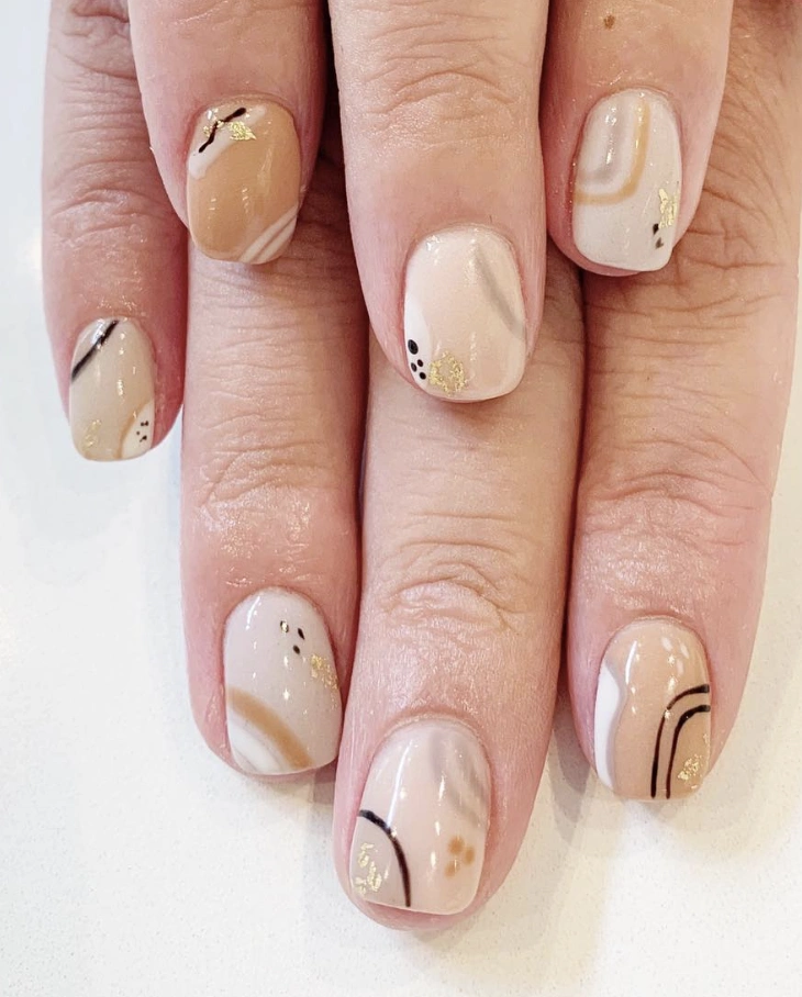 Nude Abstract Swirl Nails with Gold Foil Accents