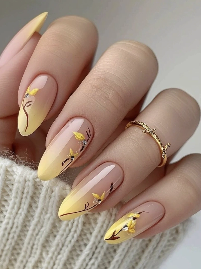 Ombre Almond Nails with Floral Detail and Light Yellow Tips
