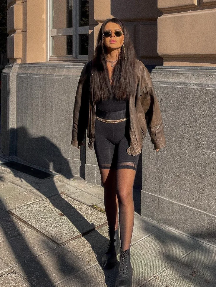 Oversized Leather Jacket + Sheer Tights + Bike Shorts