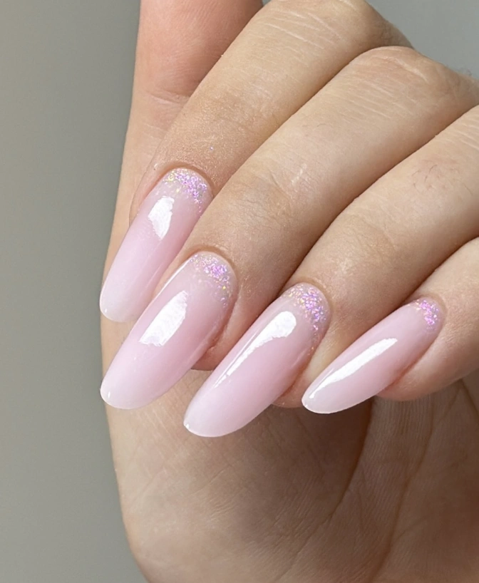 Pale Pink Almond Nails with Holographic Glitter Tips