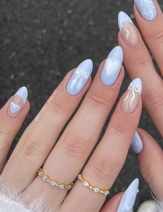 Pastel Blue Almond Nails with Bow and Heart Decals