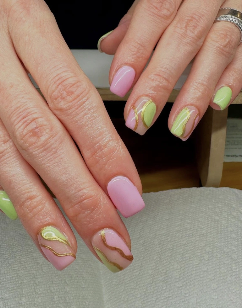 Pastel Dreams: Pink and Pistachio Abstract Nails with Gold Detail