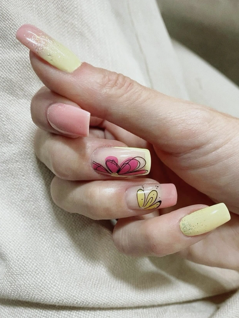 Pastel Ombre Nails with Floral Outlines