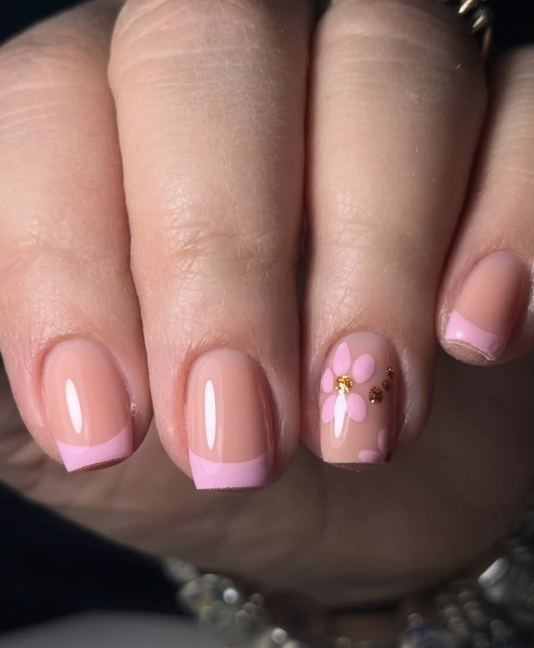 Pastel Pink French Tips with Floral Accent Nail