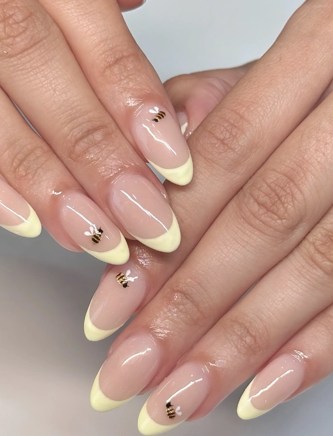 Pastel Yellow French Tips with Tiny Bee Accents