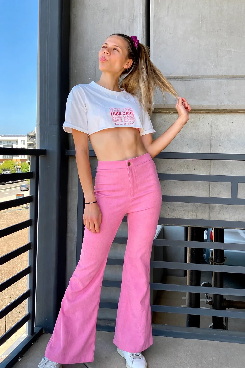 Pink High-waisted Pants + White Cropped Tee + White Sneakers