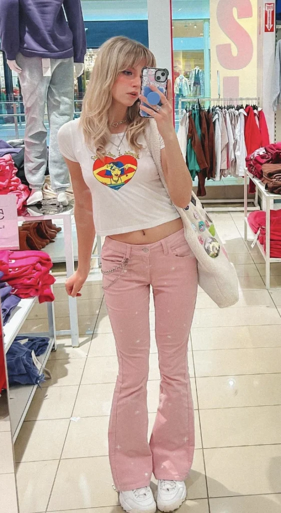 Pink Jeans + Graphic Crop Top + Casual White Sneakers