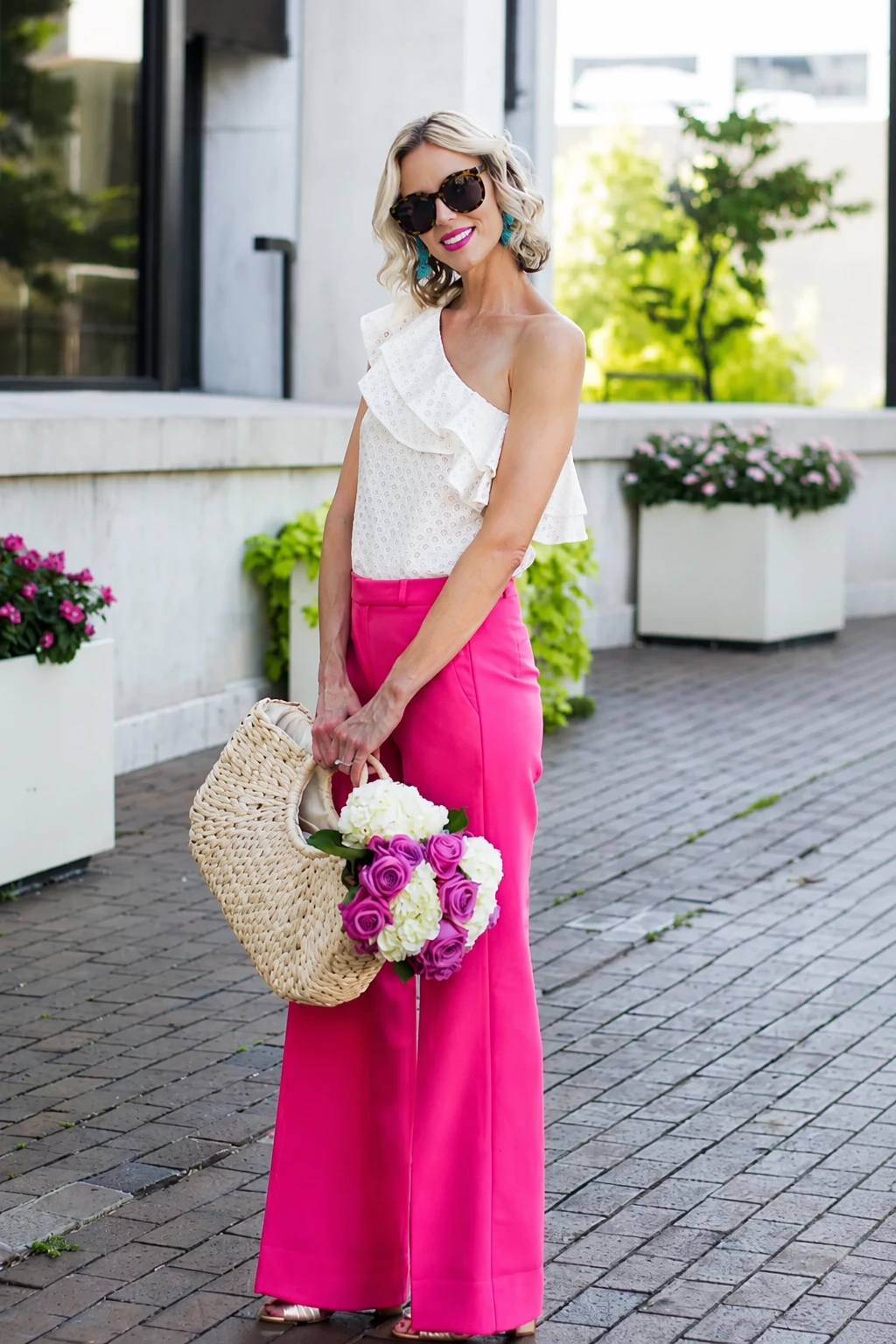 Pink Pants + One-Shoulder Ruffle Top + Straw Bag