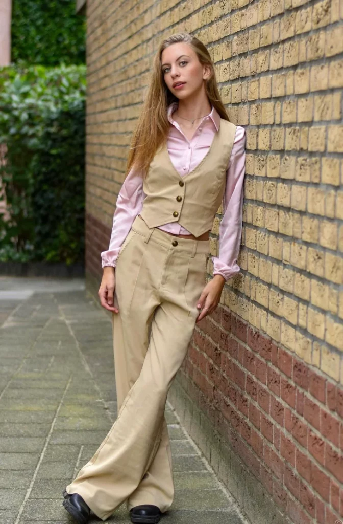 Pink Satin Button-Up Shirt + Beige Vest + Beige Wide-Leg Trousers + Black Loafers