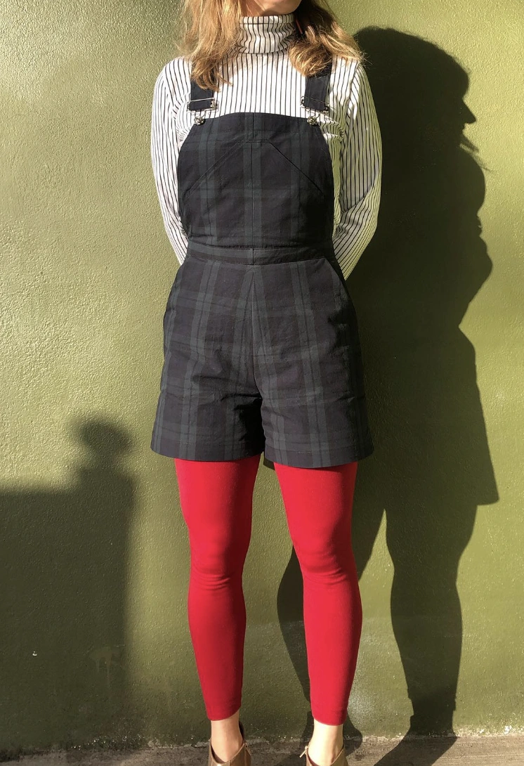 Plaid Overall Shorts + Striped Turtleneck + Red Leggings + Beige Ankle Boots