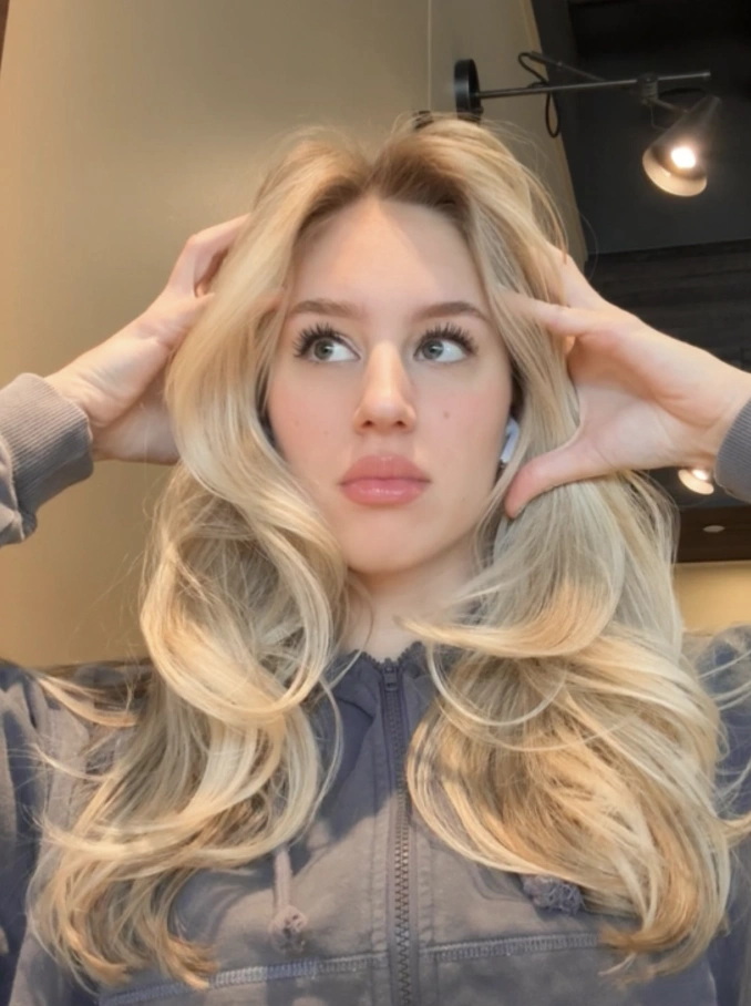 Platinum Blonde Layers with Face-Framing Waves