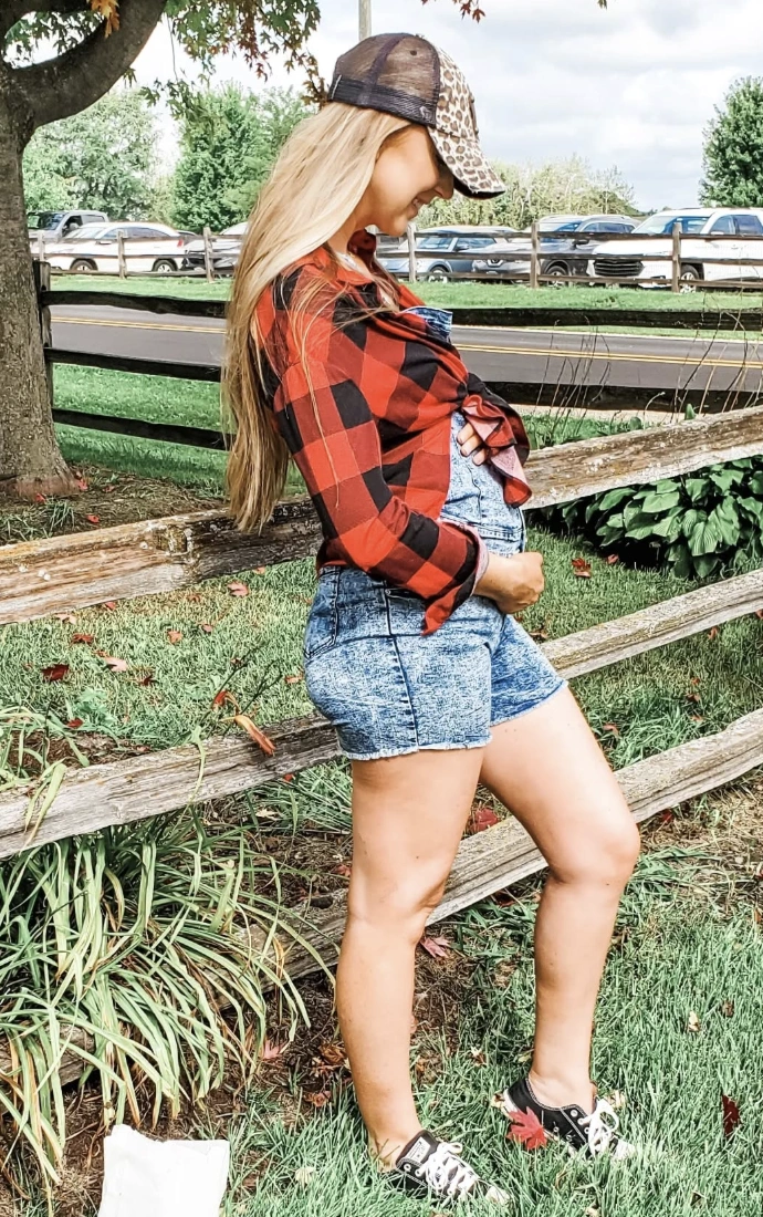 Red Plaid Shirt + Denim Overalls + Black Sneakers + Leopard Print Cap