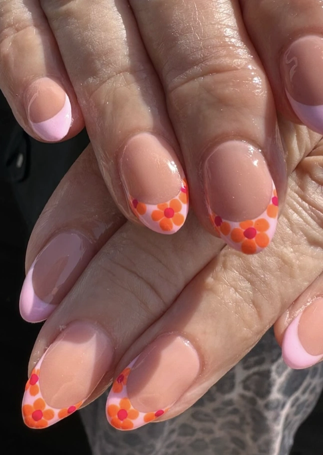 Retro Floral French Tips on Almond-Shaped Nails