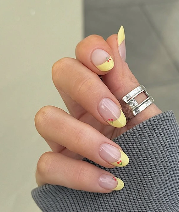 Retro French Manicure with Cherry Details and Buttery Yellow Tips