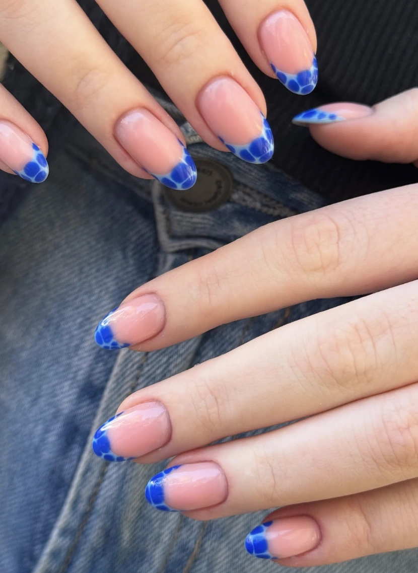 Sapphire Dot French on Almond Nails