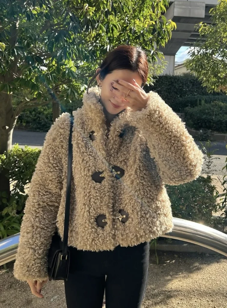 Shearling Elevated Collar Jacket + Black Skinny Jeans + Structured Shoulder Bag