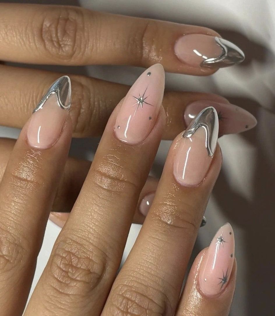 Sheer Almond Nails with Chrome Drip and Star Details