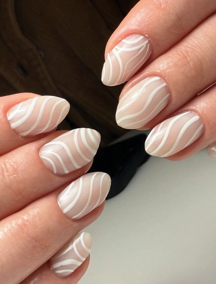 Sheer Almond Nails with Flowing White Line Design