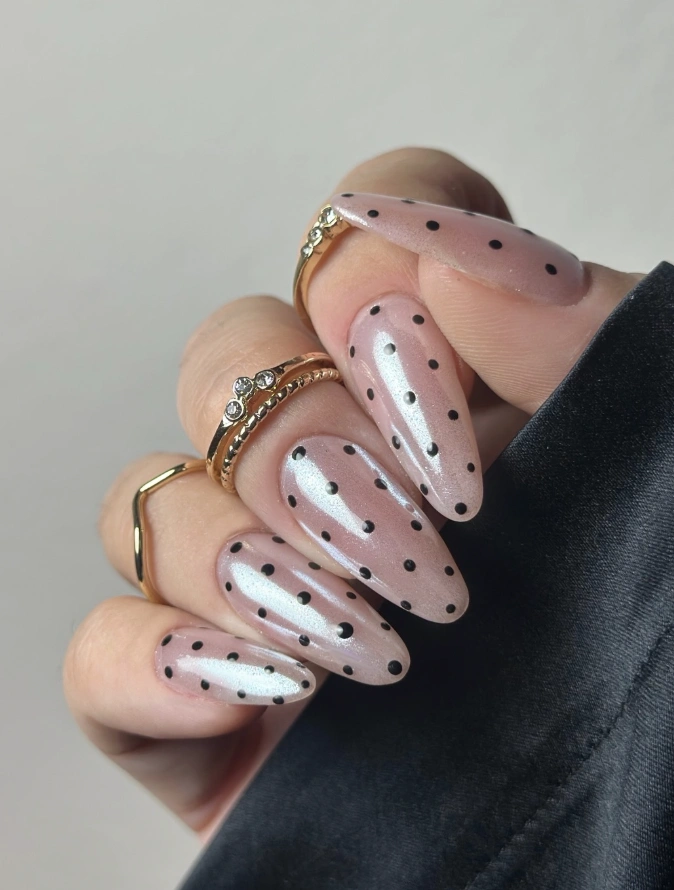 Sheer Almond Nails with Tiny Black Polka Dots