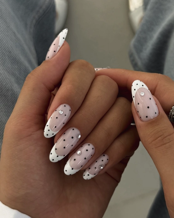Sheer Oval Nails with White Tips and Black Dotted Nail Art