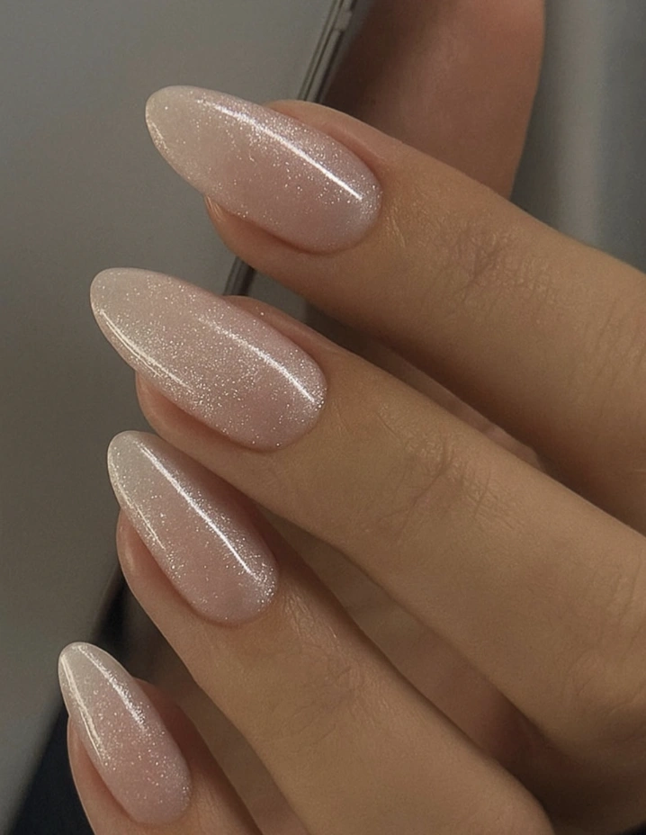 Sheer Shimmer Nude Almond Nails