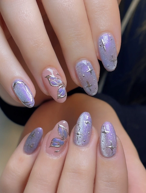 Shimmering Lavender Nails with Silver Accents and Butterfly Details