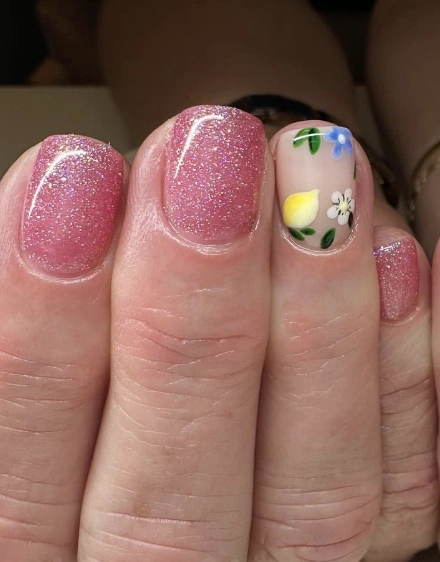Shimmering Pink Gel Nails with Lemon and Floral Accent