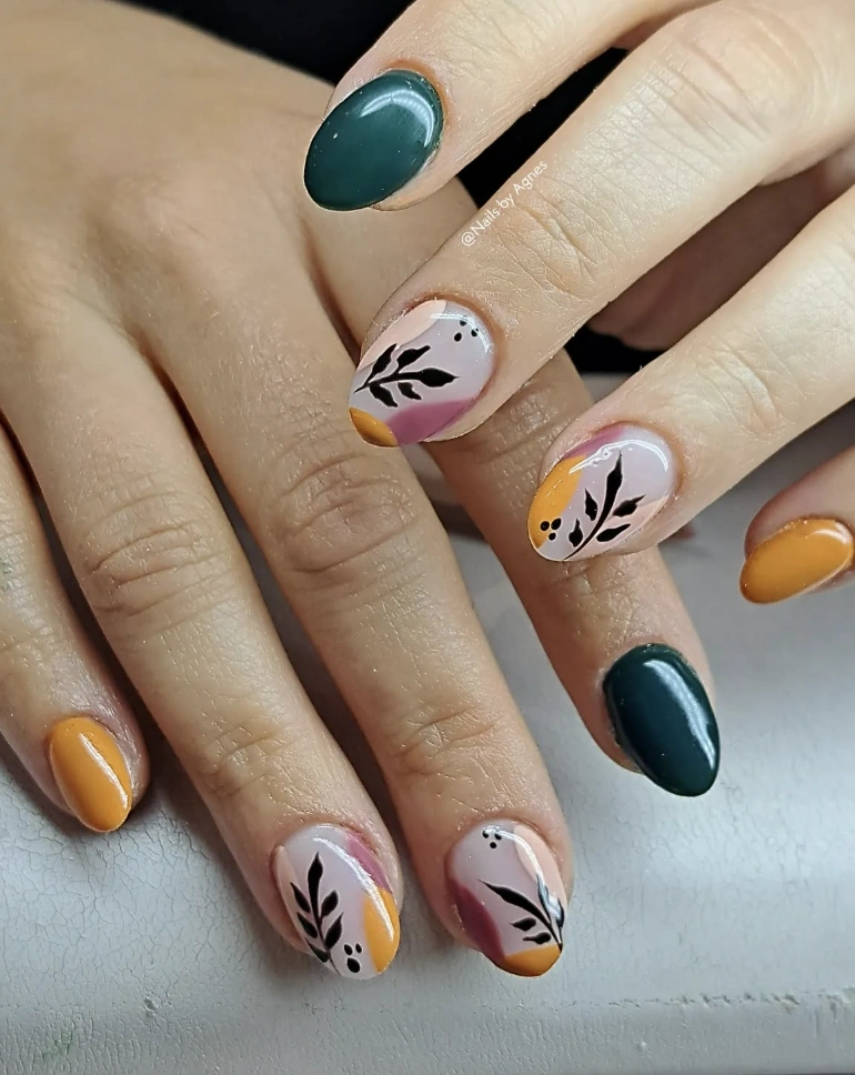 Short Almond Autumn Nails with Deep Green, Mustard Yellow, and Elegant Leaf Designs