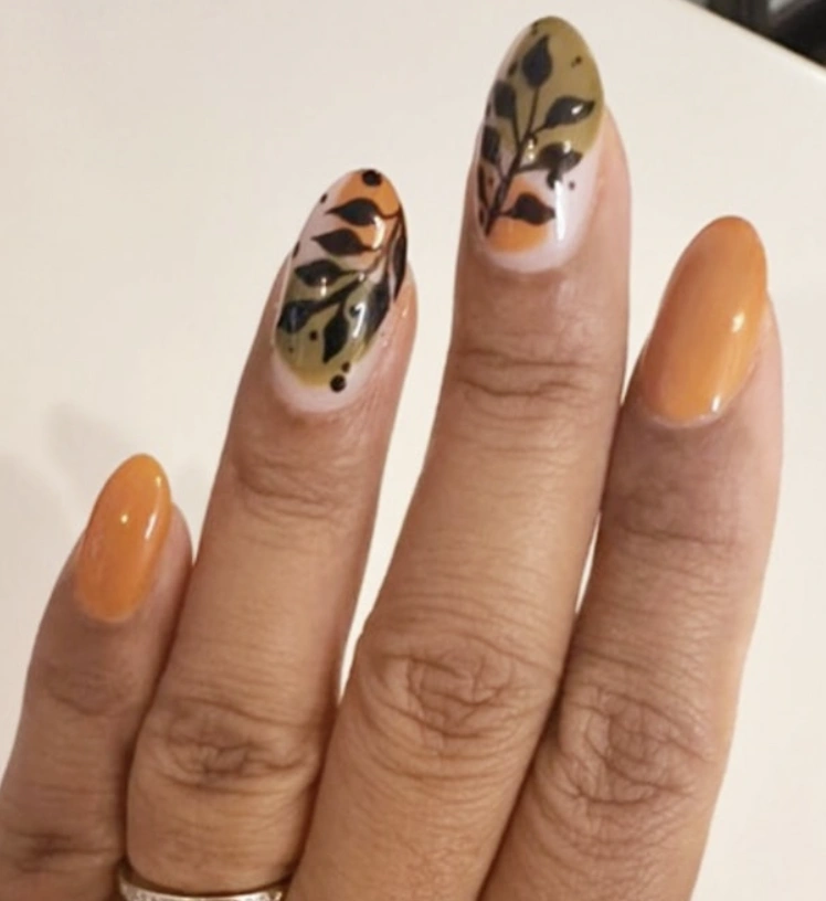 Short Almond Fall Nails with Earthy Tones and Leafy Designs