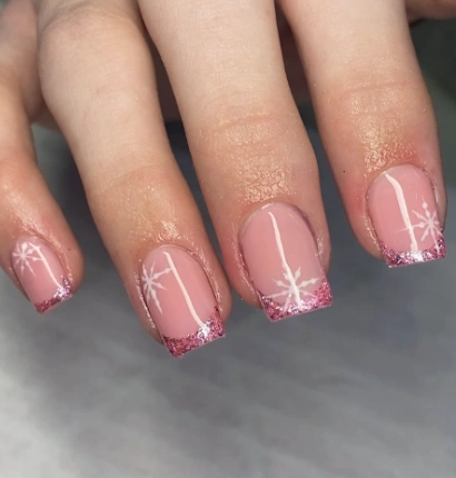 Short Square Nails with Pink Glitter Tips and Snowflake Detail