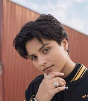 Short Tomboy Haircut with Textured Layers and Side Swept Bangs