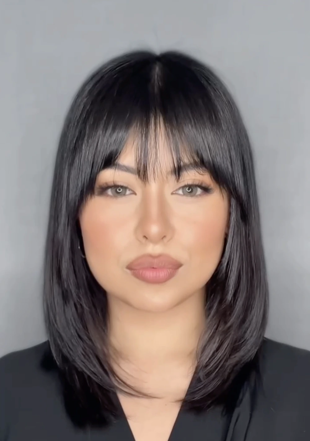 Shoulder-Grazing Bob with Center Part and Soft Curtain Bangs
