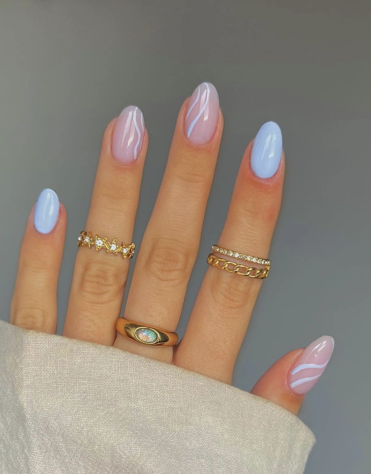 Sky Blue Almond Nails with Abstract White Accents