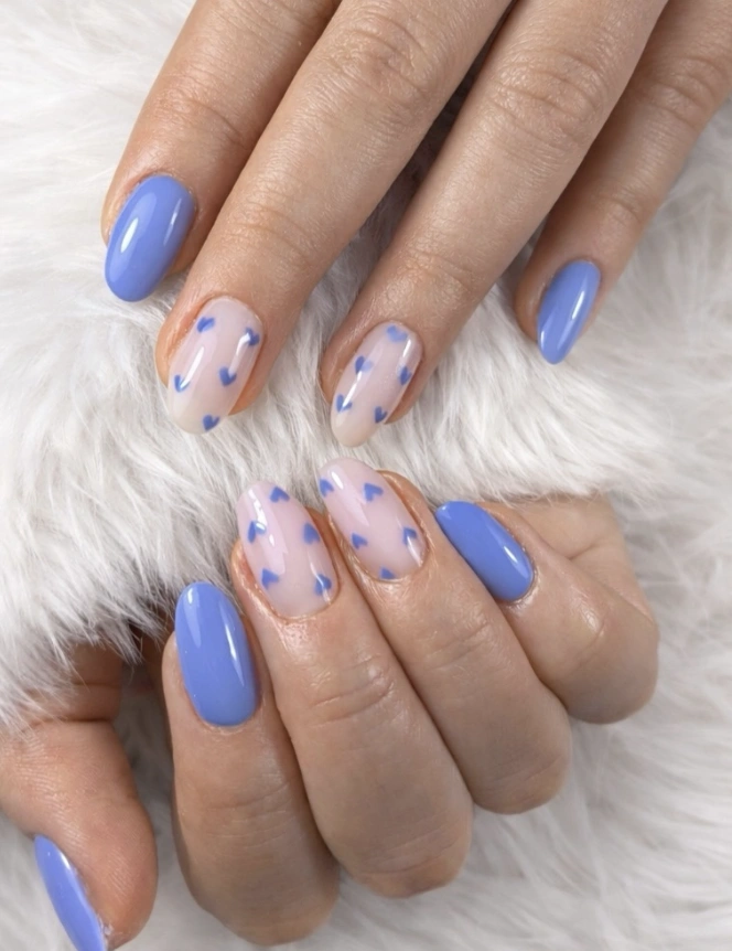Sky Blue Almond Nails with Tiny Heart Accents