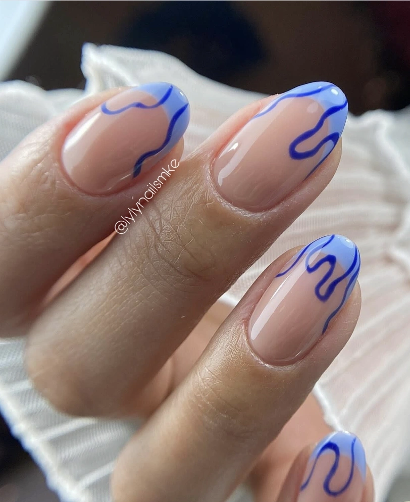 Sky Blue Drip Accent on Nude Almond Nails