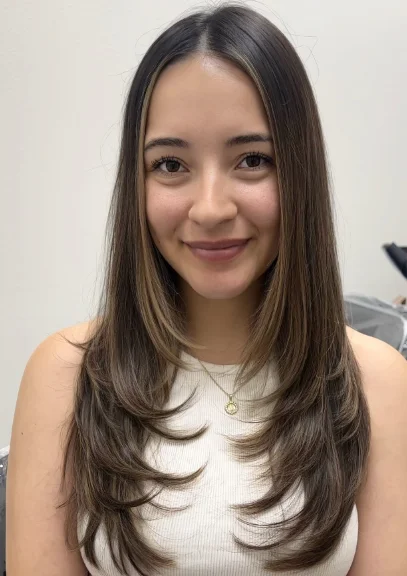Sleek Medium Layered Hair with Subtle Ends