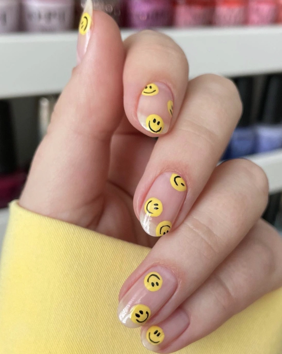Smiley Face Stickers on Natural Short Nails