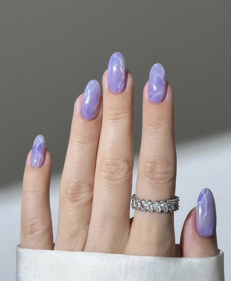Soft Lavender Marble Almond Nails
