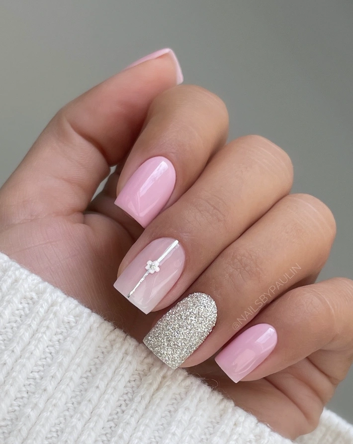 Soft Pink Manicure with Silver Glitter Accent Nail and Floral Detail
