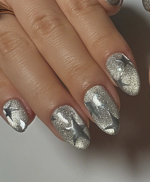 Sparkling Silver Almond Nails with Raised Star Accents