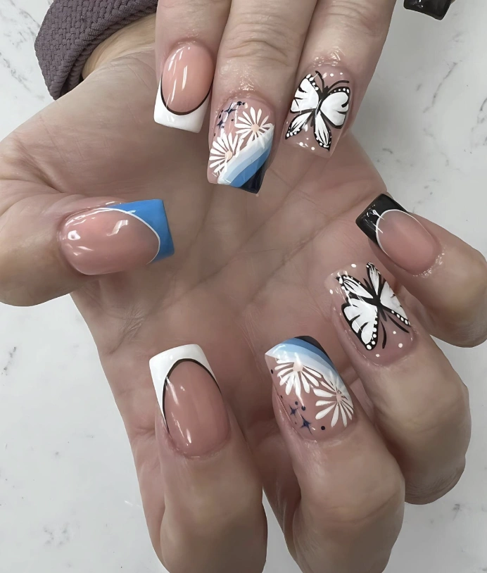 Square French Tip Nails with Butterflies and Floral Accent