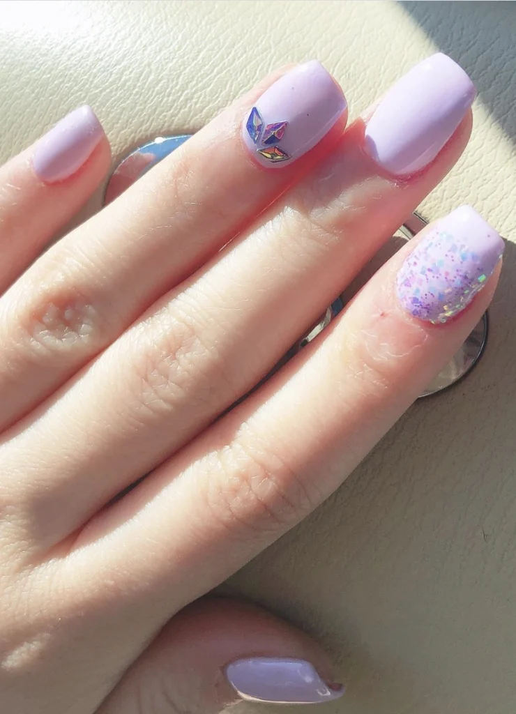 Square Lavender French Tip Nails with Sparkling Glitter and Gem Accents