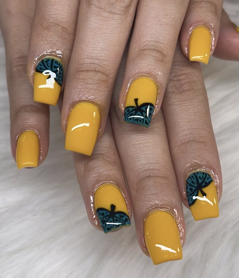 Square Nails in Mustard Yellow with Intricate Teal Leaf Designs