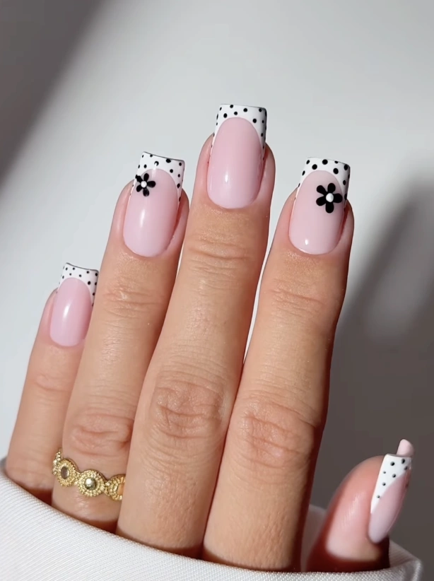 Square Pale Pink Nails with Black Polka Dot Tips and Flower Accent