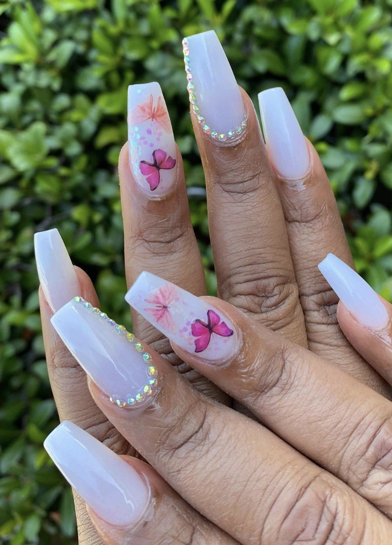Square White Nails with Butterfly Decals and Rhinestone Accents